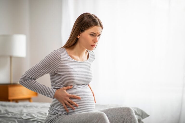 Braxton,Hicks,Contractions.,Young,Pregnant,Female,Feeling,Pain,,Suffering,From